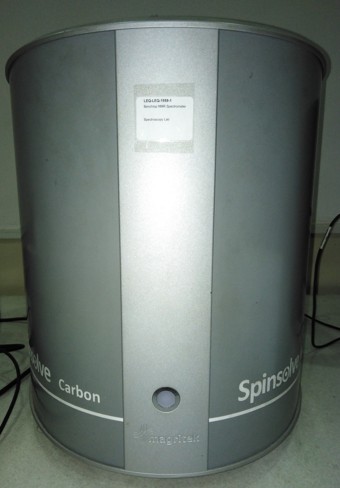 A close-up of a grey cylinder  Description automatically generated